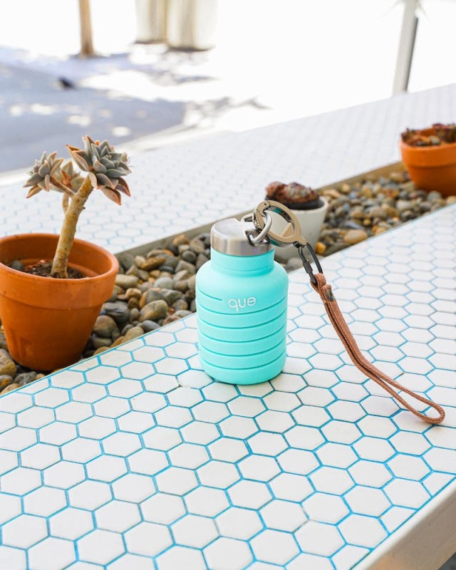 غطاء قارورة كيو معدني مع حلقة تعليق