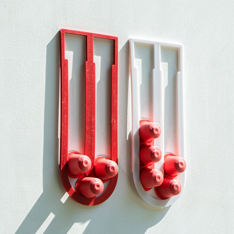 حامل كبسولات جداري