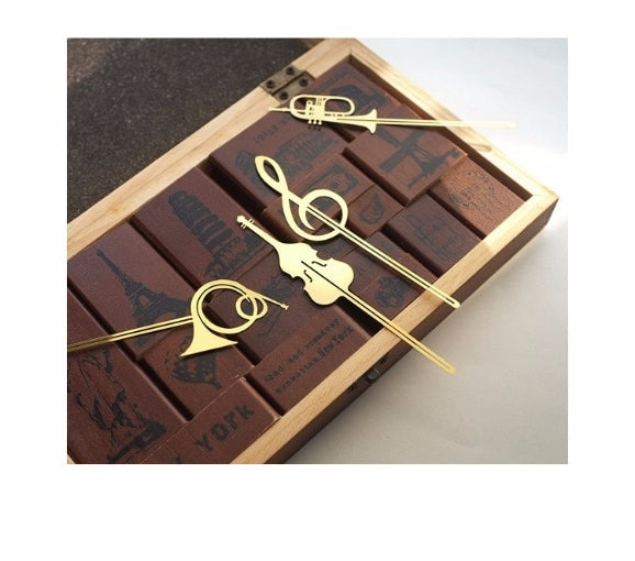 فاصل معدني للكتب - آلات موسيقية